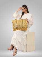Gold color lycra handbag