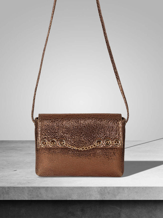brown handbag with gold detailed work
