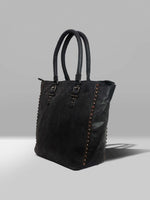 Black handbag with studs and zip